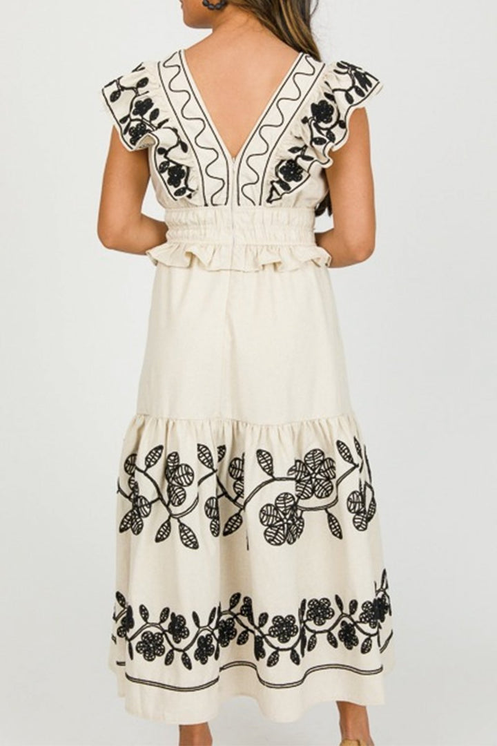 Contrast embroidered dress