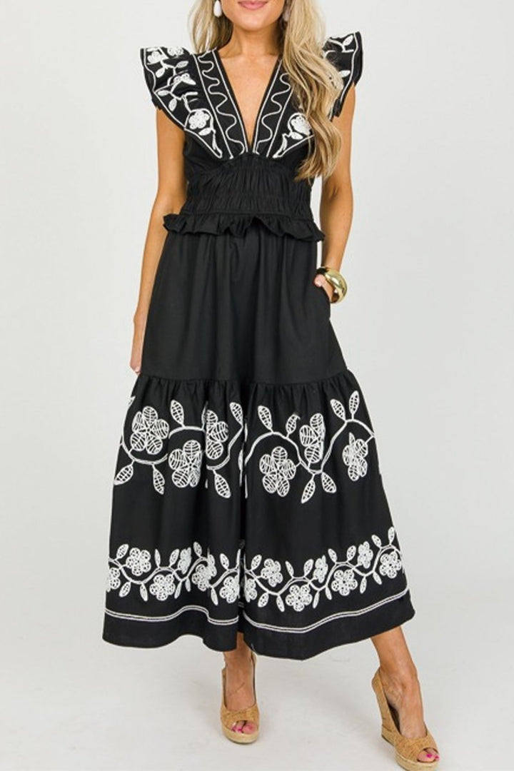 Contrast embroidered dress